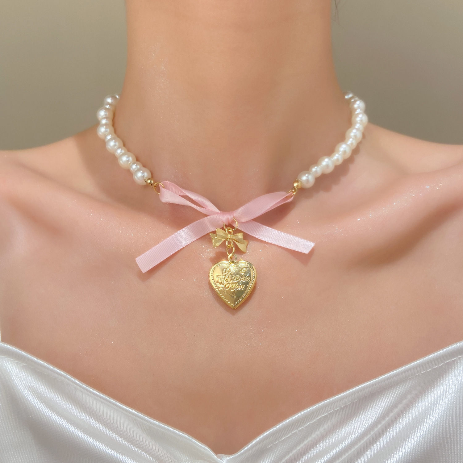 French Romantic Pink Bowknot H - Pearl Trim Chain recensie en prijs